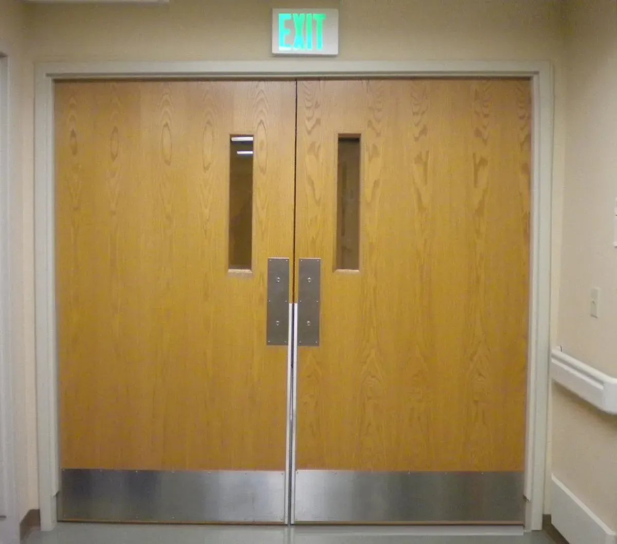 Door without handles, obviously for pushing only